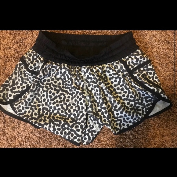 Blue Lululemon shorts with black dots on them - Picture 2 of 2